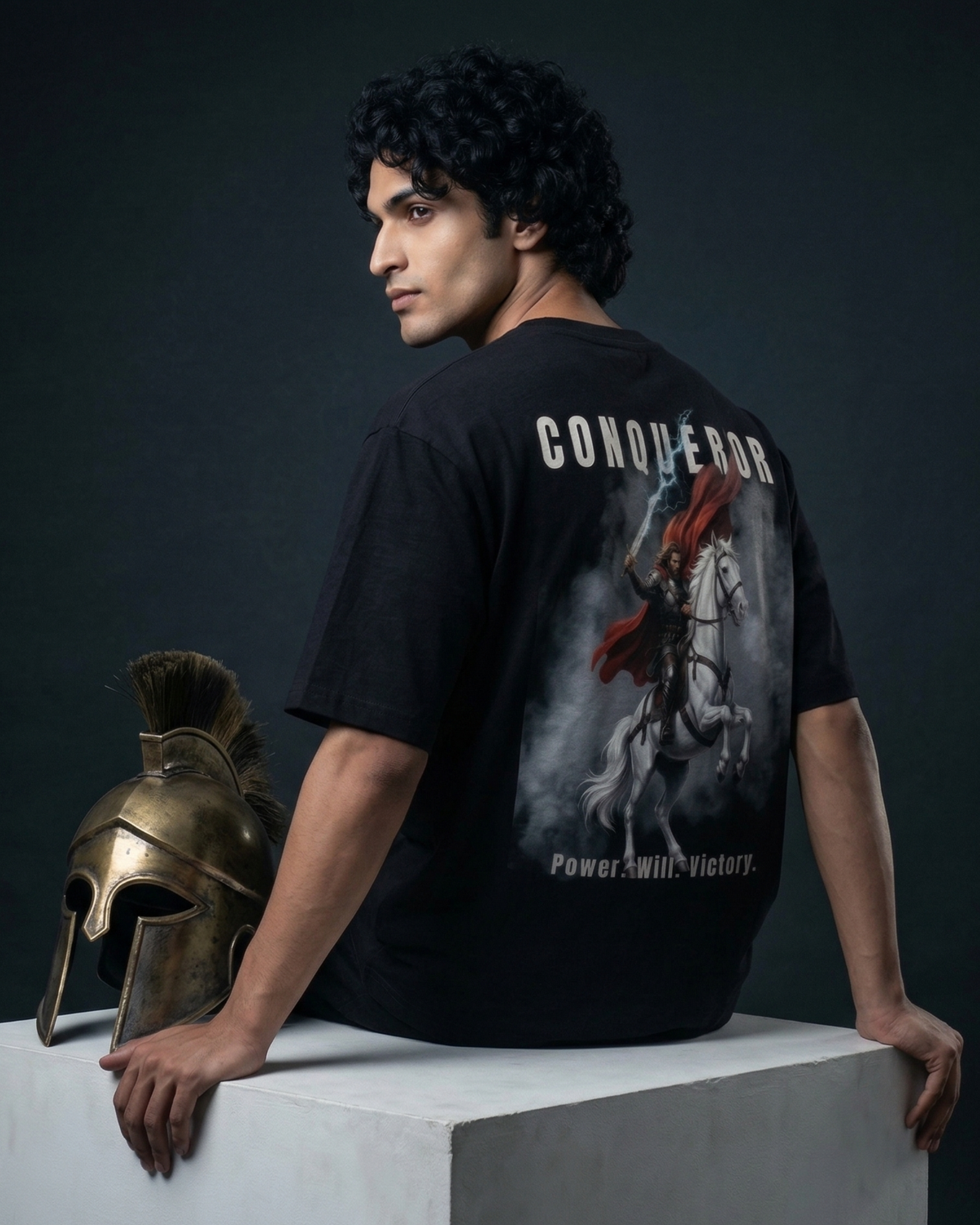 Modaest Conqueror oversized T-shirt with bold graphic design, relaxed fit, and casual streetwear style.