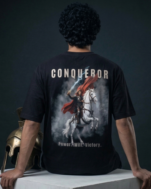 Modaest Conqueror oversized T-shirt with a bold graphic design, relaxed fit, and comfortable cotton fabric.