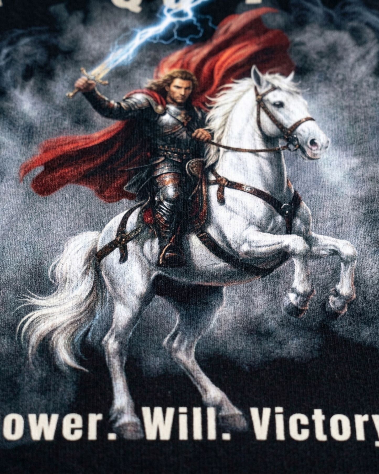 Man on a white horse with a red cape and sword, against a dark background with text 'Power. Will. Victory'.
