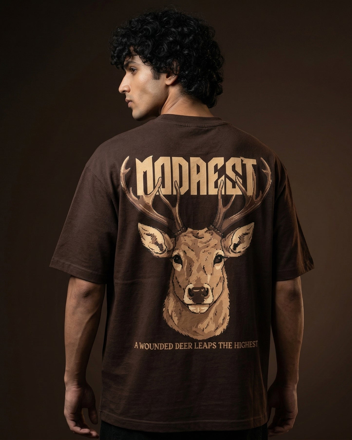 Modaest Apex Stag oversized T-shirt featuring a bold stag graphic on a relaxed fit cotton tee.