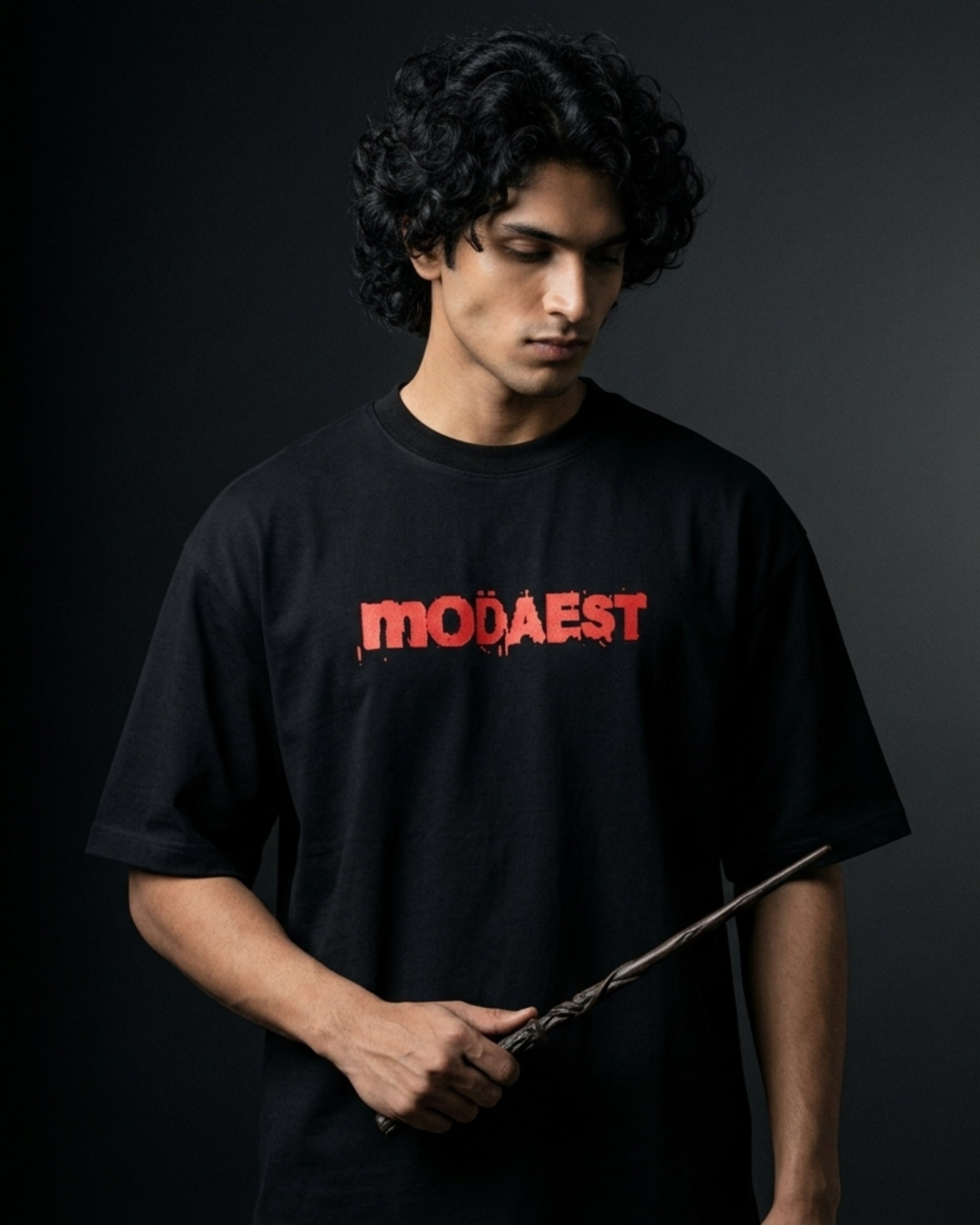 Modaest Arcanum oversized T-shirt with a modern graphic design, casual fit, and soft fabric for comfortable everyday wear.