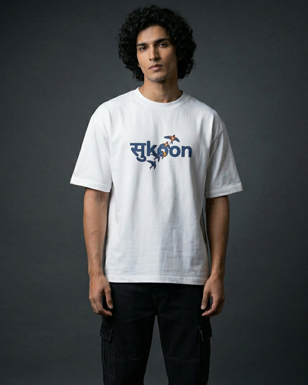 Light grey Modaest Sukoon oversized t-shirt with a relaxed fit and casual design, displayed on a plain background.