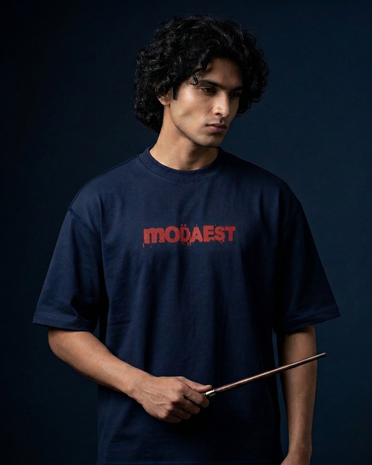 Modaest Arcanum oversized T-shirt with a minimalist graphic design, soft fabric, and relaxed fit for casual wear.