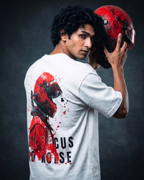 Back view of Modaest Focus Mode oversized T-shirt featuring a helmet graphic on the back.