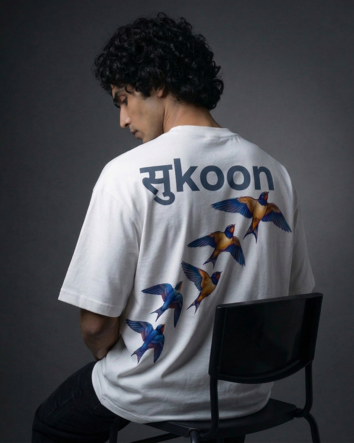 Modaest Sukoon oversized T-shirt worn casually, featuring a relaxed fit and soft fabric in a stylish, comfortable everyday look.